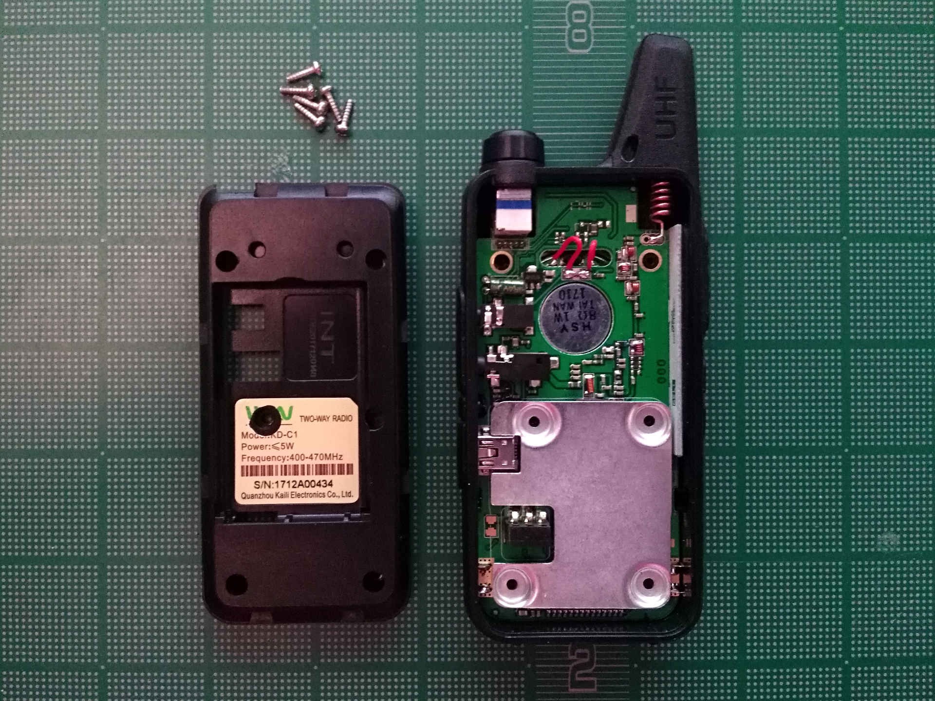 Radio with back half removed exposing PCB
